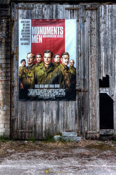 Ein Plakat an der Wand