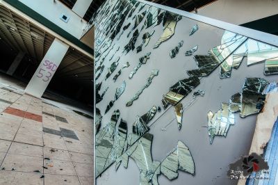 Ein Spiegel, der in einem Gebäude gebrochen und gebrochen ist